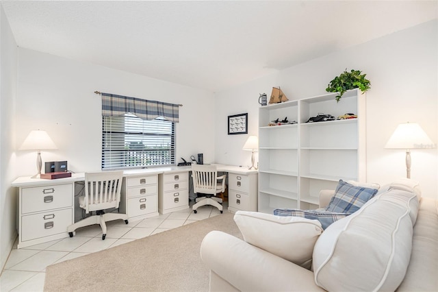 4570 Ocean Beach Blvd Unit 226, Cocoa Beach, FL 32931 - office area featuring light tile patterned floors and built in study area
