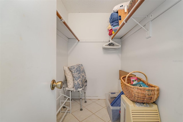 4570 Ocean Beach Blvd Unit 226, Cocoa Beach, FL 32931 - spacious closet featuring tile patterned floors