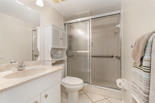 4570 Ocean Beach Blvd Unit 226, Cocoa Beach, FL 32931 - full bathroom with vanity, a shower stall, and tile patterned floors