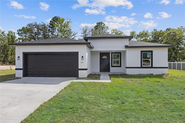 764 Marion Oaks Mnr, Ocala, FL 34473 - prairie-style house with driveway, an attached garage, stucco siding, and a front lawn