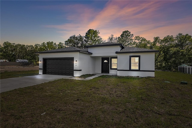 764 Marion Oaks Mnr, Ocala, FL 34473 - prairie-style home featuring an attached garage, concrete driveway, stucco siding, and a lawn