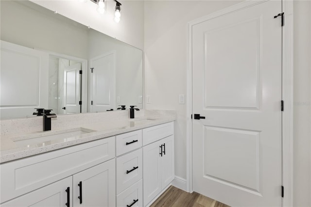 764 Marion Oaks Mnr, Ocala, FL 34473 - full bathroom featuring double vanity and wood finished floors