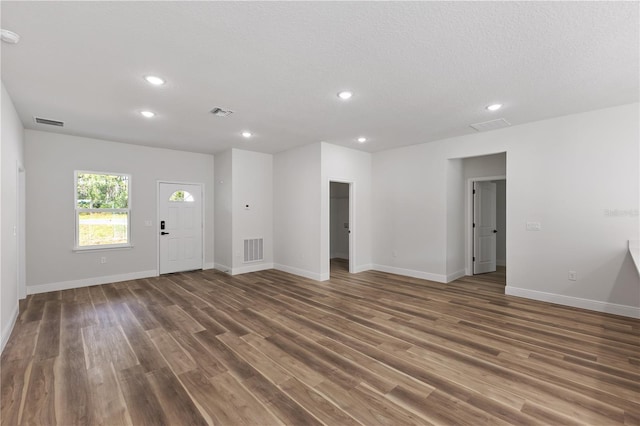 764 Marion Oaks Mnr, Ocala, FL 34473 - unfurnished living room featuring wood finished floors and recessed lighting