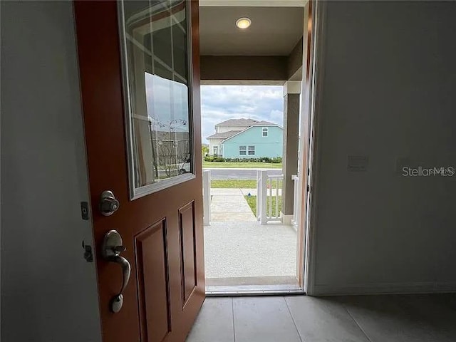 2343 Garden Belle Dr, Clermont, FL 34711 - doorway with light tile patterned floors
