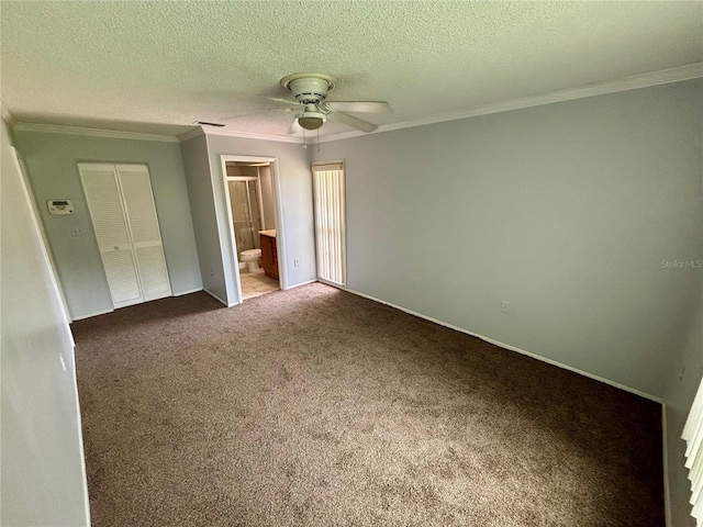 8131 Braddock Cir Unit 1, Port Richey, FL 34668 - unfurnished bedroom with carpet floors, ornamental molding, ensuite bath, and ceiling fan