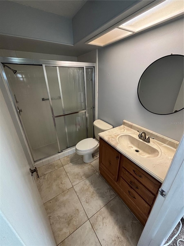 8131 Braddock Cir Unit 1, Port Richey, FL 34668 - full bath with vanity, a stall shower, and tile patterned flooring