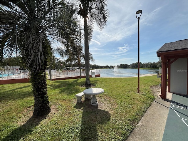 8131 Braddock Cir Unit 1, Port Richey, FL 34668 - view of yard with a water view