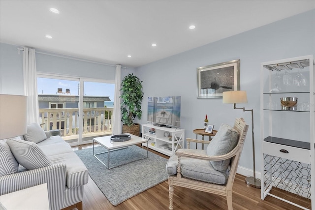 2790 Ocean Shore Blvd Unit 8N, Ormond Beach, FL 32176 - living area with wood finished floors and recessed lighting