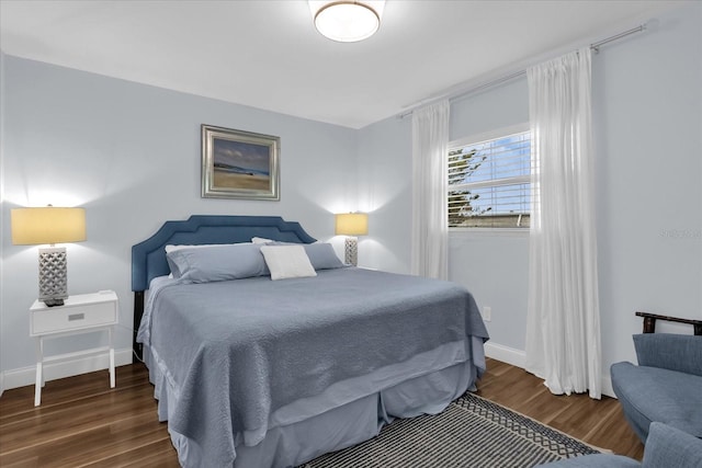 2790 Ocean Shore Blvd Unit 8N, Ormond Beach, FL 32176 - bedroom featuring wood finished floors and baseboards