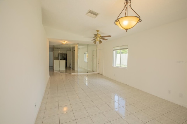 1711 SW 116th Way, Miramar, FL 33025 - spare room featuring light tile patterned floors and a ceiling fan