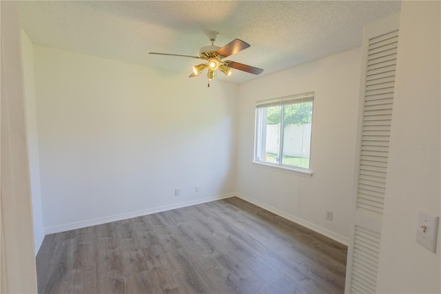 1711 SW 116th Way, Miramar, FL 33025 - unfurnished room featuring wood finished floors, a ceiling fan, and a textured ceiling