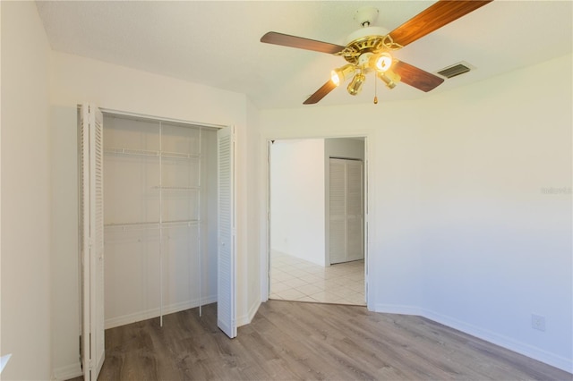 1711 SW 116th Way, Miramar, FL 33025 - unfurnished bedroom with a closet, light wood-style floors, and ceiling fan