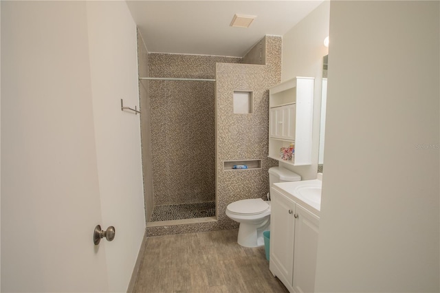 1711 SW 116th Way, Miramar, FL 33025 - full bathroom with vanity, a walk in shower, and wood finished floors