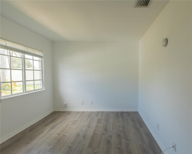 1711 SW 116th Way, Miramar, FL 33025 - spare room featuring wood finished floors and baseboards
