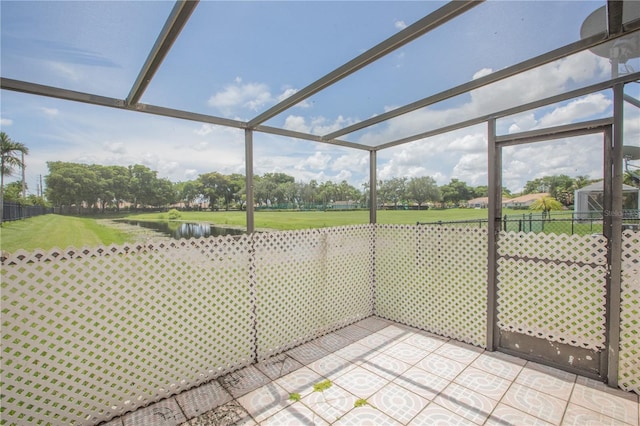 1711 SW 116th Way, Miramar, FL 33025 - unfurnished sunroom featuring a water view and view of golf course