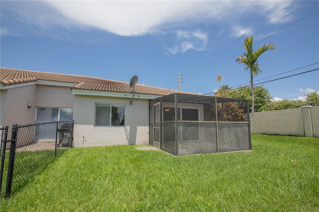 1711 SW 116th Way, Miramar, FL 33025 - back of property featuring stucco siding, a fenced backyard, and a tiled roof