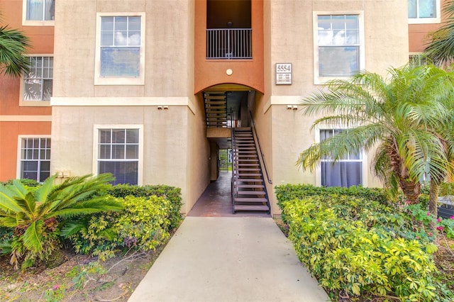 5554 Metrowest Blvd Unit 305, Orlando, FL 32811 - entrance to property featuring stucco siding