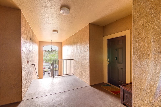 5554 Metrowest Blvd Unit 305, Orlando, FL 32811 - property entrance featuring stucco siding and a balcony