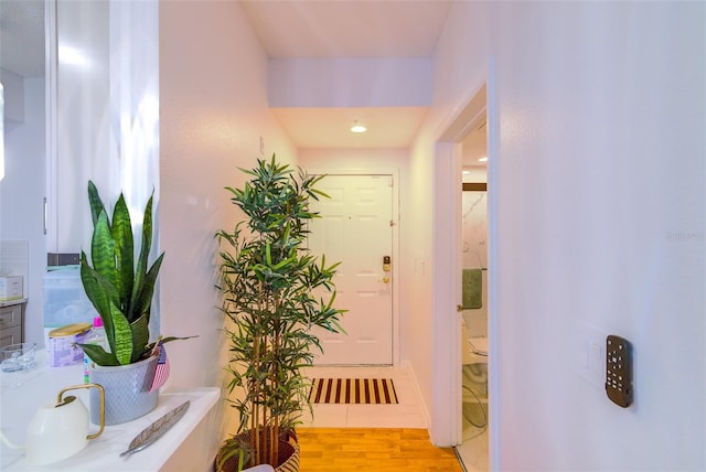 5554 Metrowest Blvd Unit 305, Orlando, FL 32811 - corridor with light tile patterned floors