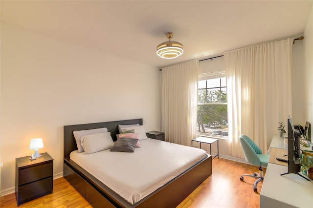 5554 Metrowest Blvd Unit 305, Orlando, FL 32811 - bedroom with light wood-style floors