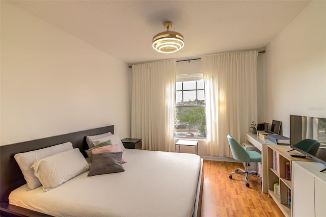 5554 Metrowest Blvd Unit 305, Orlando, FL 32811 - bedroom featuring light wood-style flooring