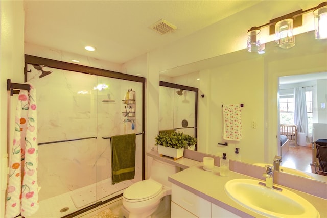 5554 Metrowest Blvd Unit 305, Orlando, FL 32811 - bathroom with a marble finish shower, vanity, and recessed lighting