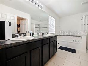 235 Whispering Pines Way, Davenport, FL 33837 - photo 18