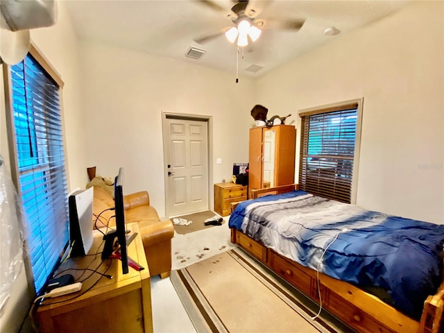 carpeted bedroom with ceiling fan