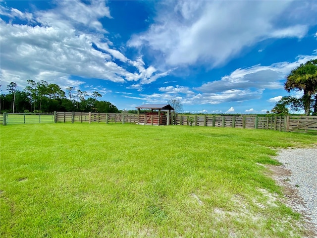 view of yard with a gazebo and a rural view