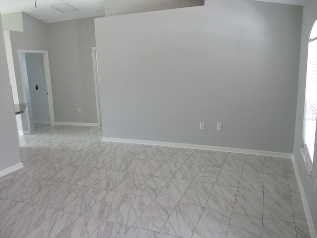 empty room with light tile flooring