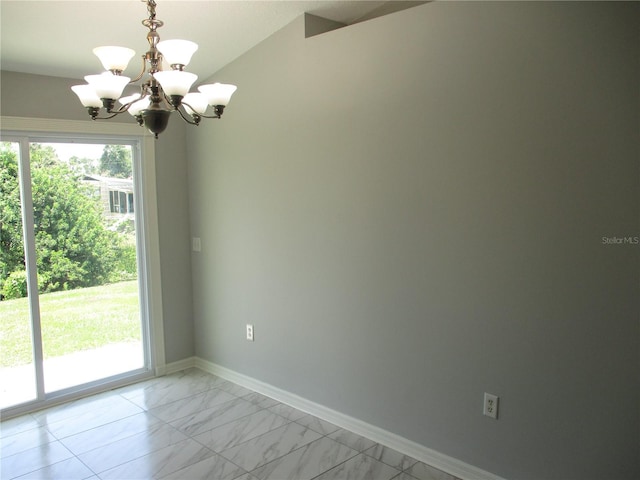 tiled spare room featuring plenty of natural light, an inviting chandelier, and lofted ceiling