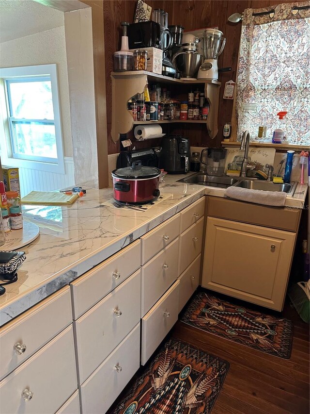 kitchen featuring sink, tile counters, and hardwood / wood-style floors