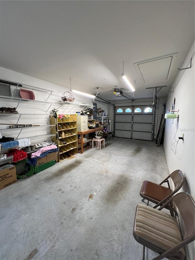 garage featuring a garage door opener