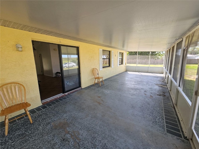 unfurnished sunroom with a healthy amount of sunlight