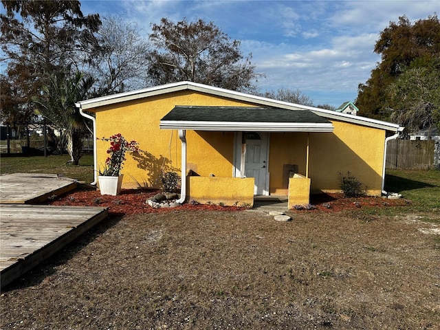 view of front of home with a deck