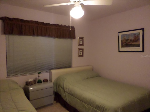 bedroom featuring ceiling fan