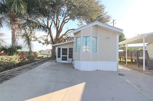 back of property with a patio