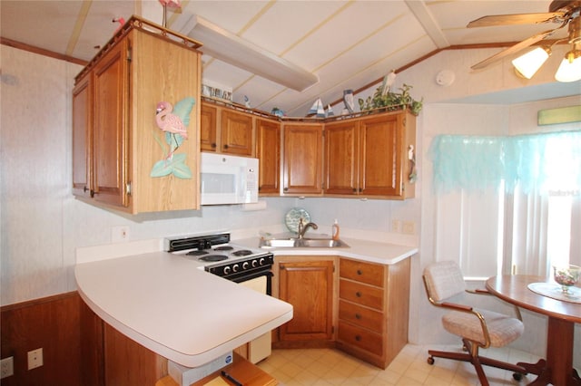 kitchen with kitchen peninsula, white appliances, ceiling fan, light tile floors, and lofted ceiling