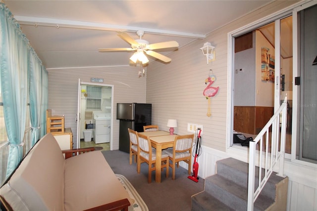 interior space featuring ceiling fan and vaulted ceiling