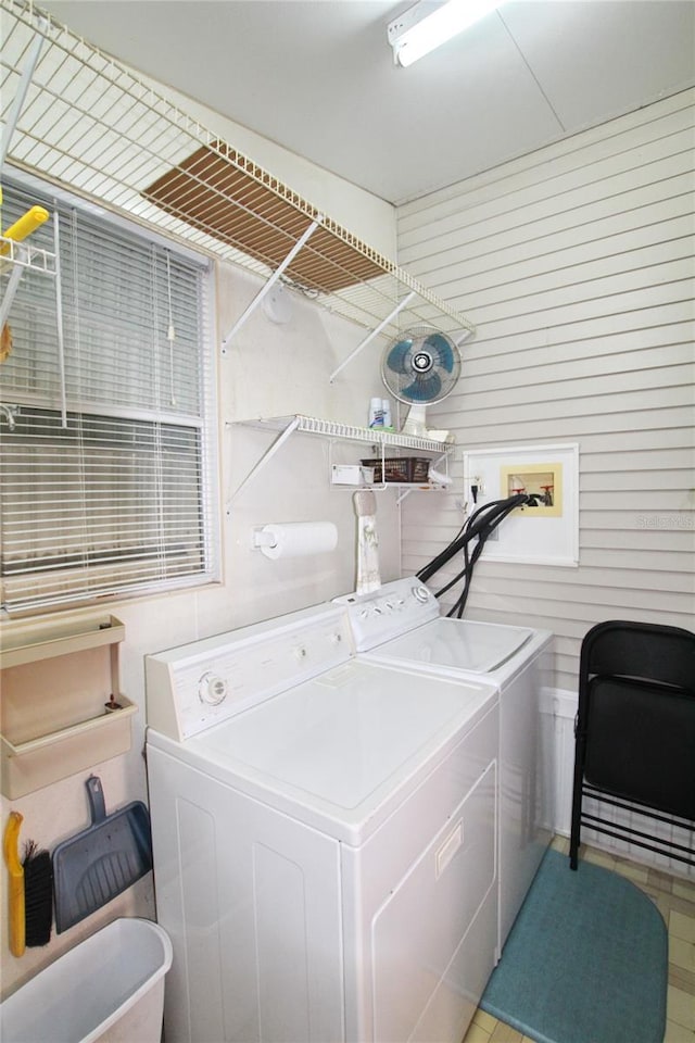 clothes washing area with washer hookup and independent washer and dryer