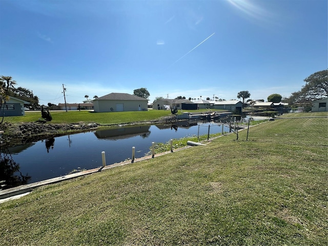 property view of water with a dock