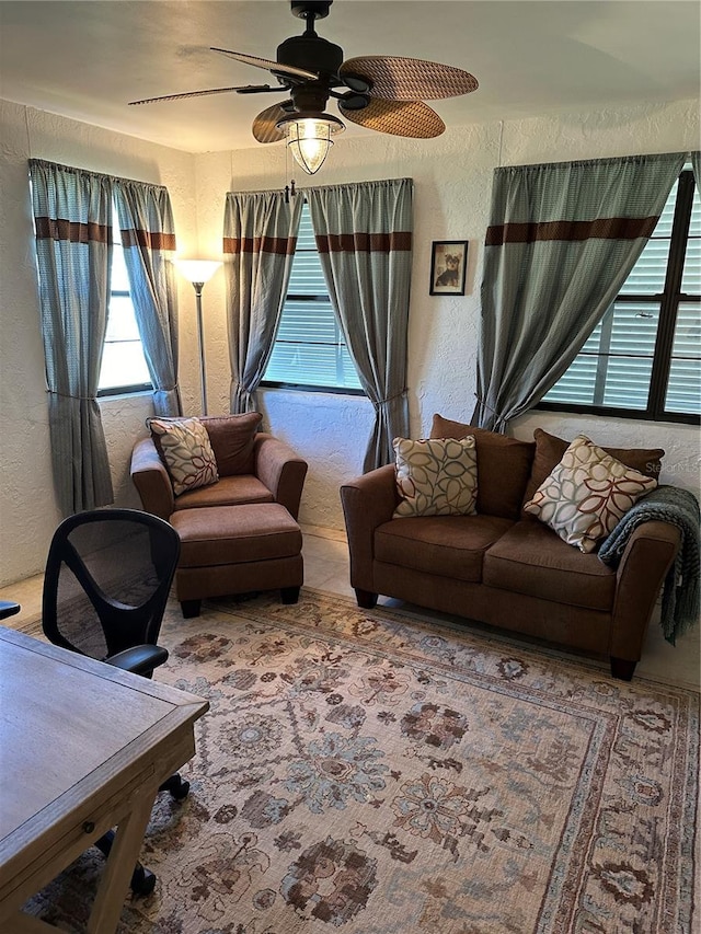 living room with ceiling fan