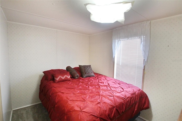 bedroom featuring carpet