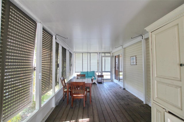 sunroom / solarium featuring a healthy amount of sunlight