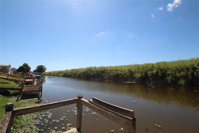 dock area featuring a water view