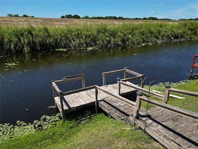 view of dock with a water view