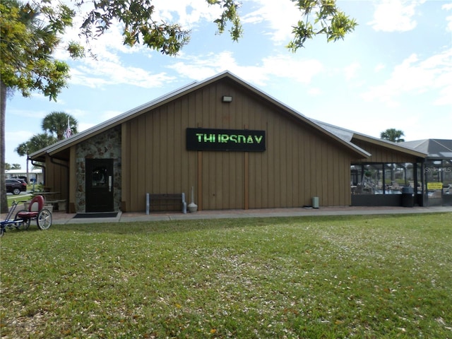 view of home's exterior featuring a lawn