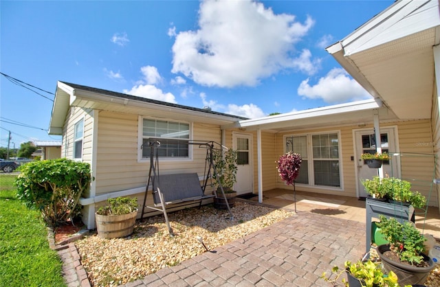 back of house featuring a patio