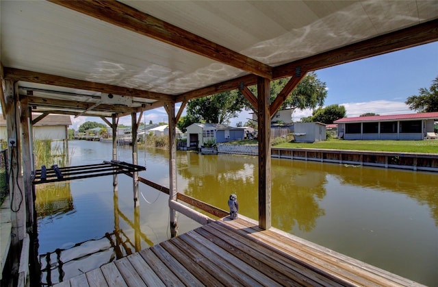 view of dock with a water view