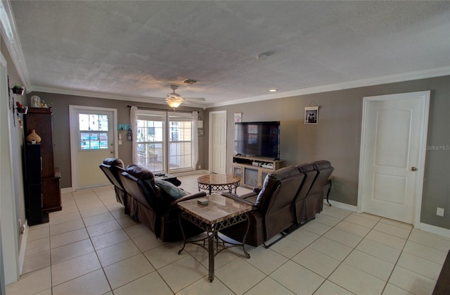 living room with crown molding, light tile patterned floors, a textured ceiling, and ceiling fan